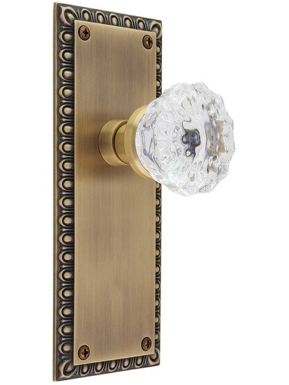 Ovolo Door Set with Fluted Crystal Glass Knobs in Antique Brass.